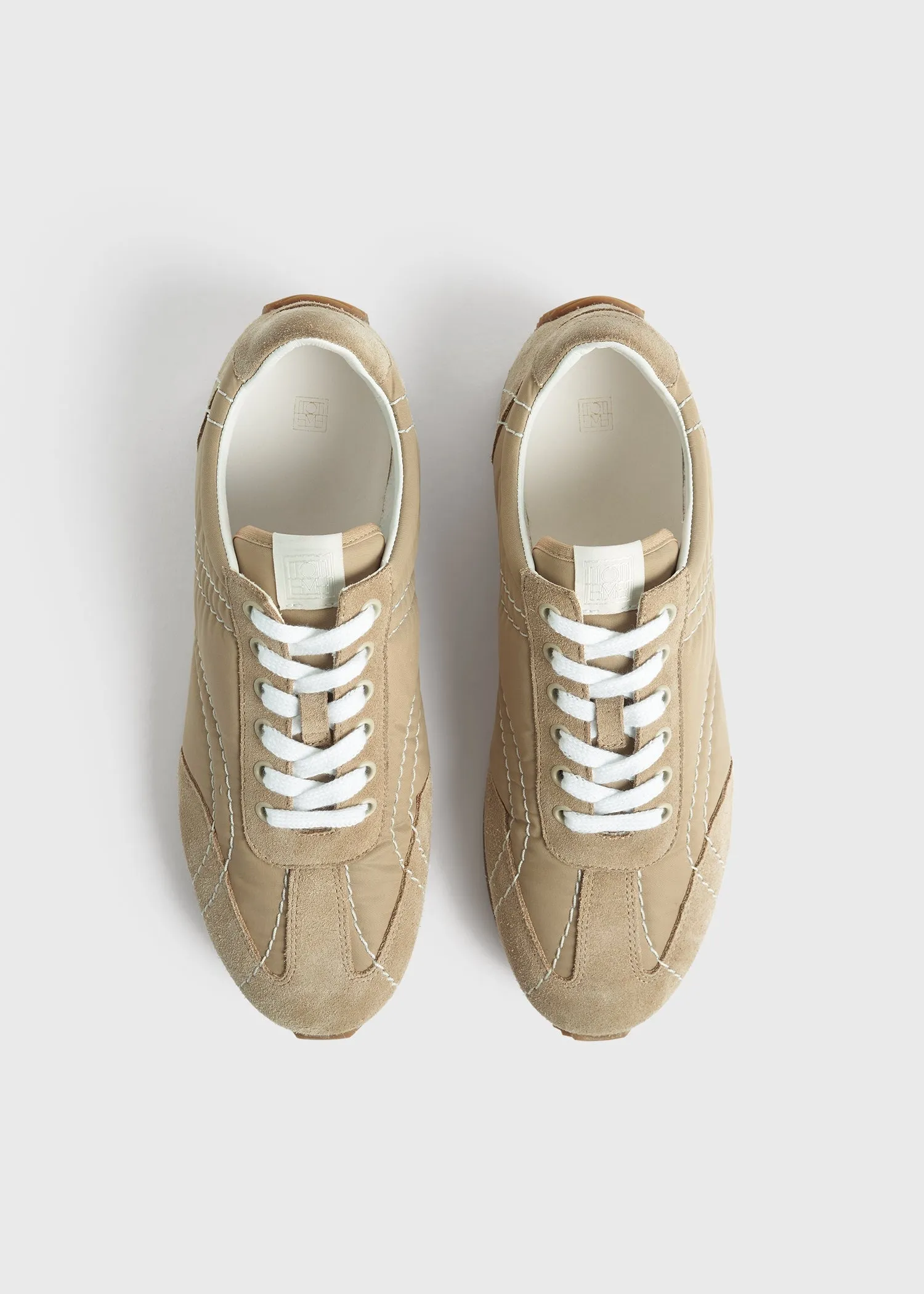 Sport sneakers sand